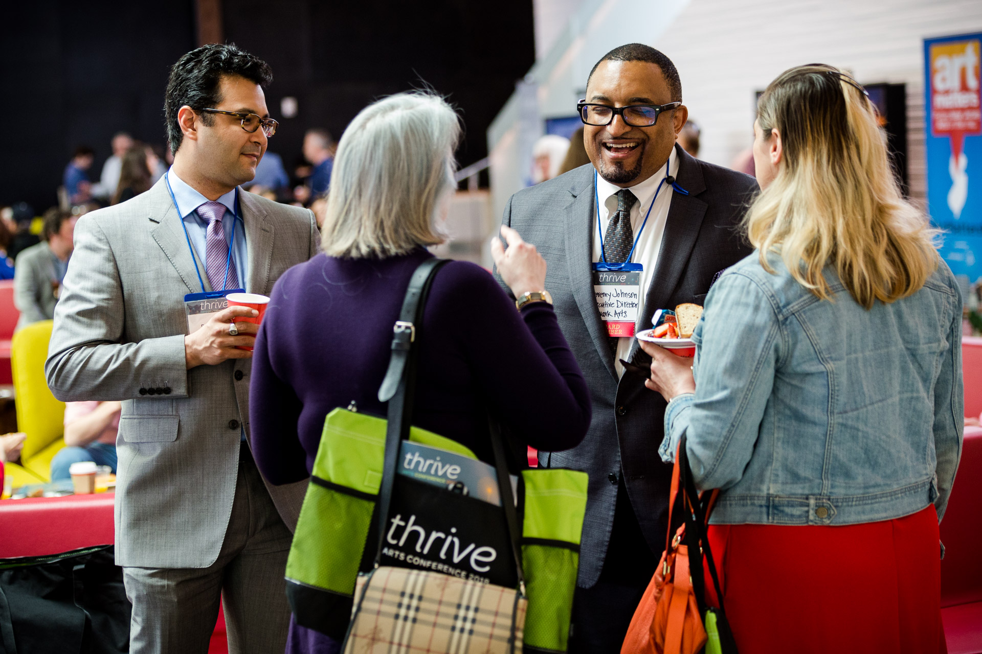 People speaking together at Thrive